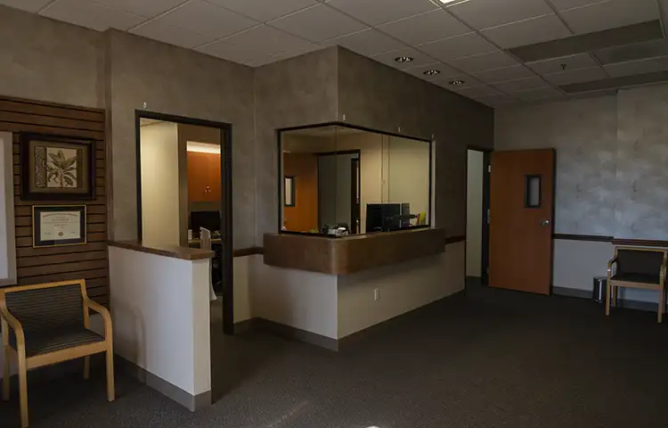 Darkened waiting room of the NPSC headache clinic.