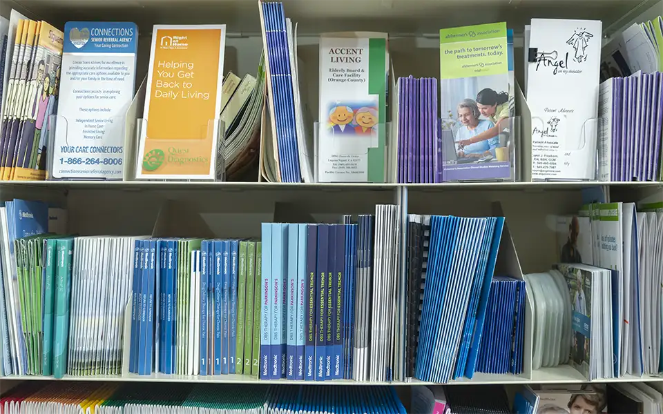 Office shelving until filled with informational pamphlets and booklets about various neurologic conditions and diseases